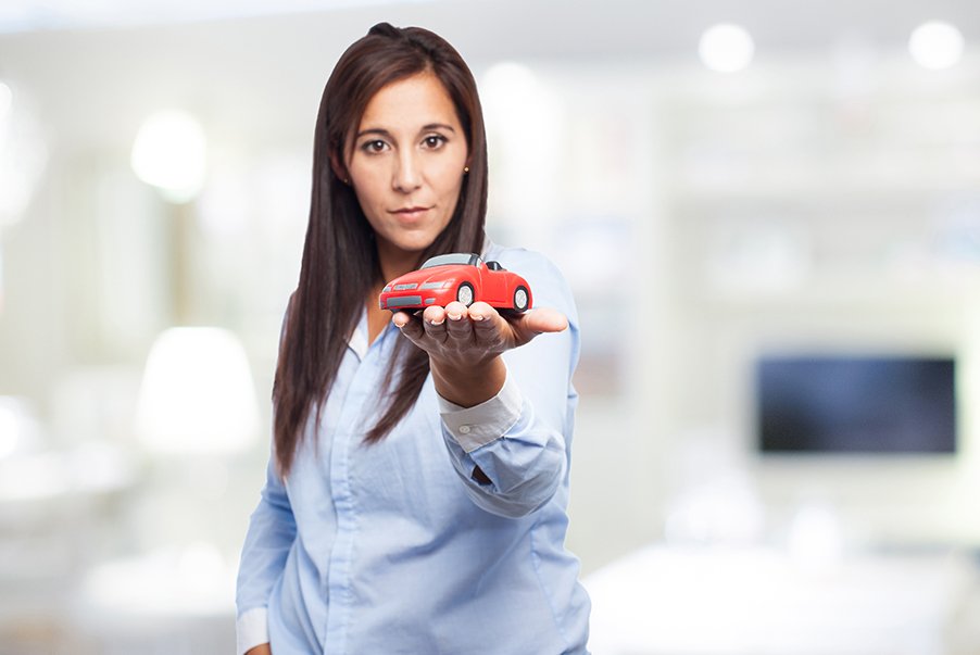 Imagen de Happy Young Woman With Red Car